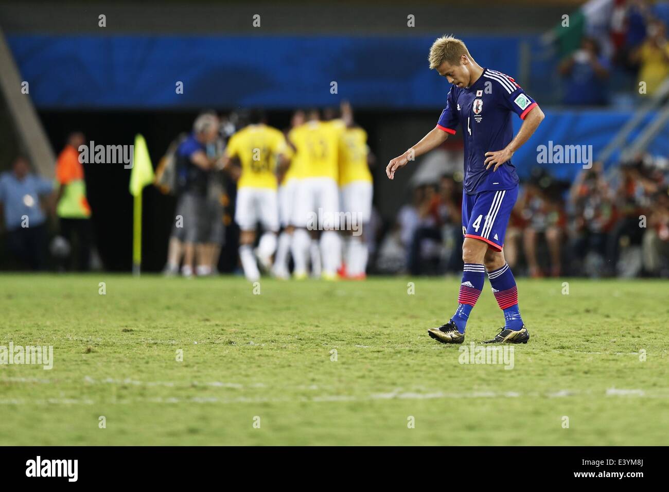 Cuiaba, Brazil. 24th June, 2014. Keisuke Honda (JPN) Football/Soccer : Honda dejected after loss goal on FIFA World Cup Brazil 2014 Group C match between Japan 1-4 Colombia at the Arena Pantanal in Cuiaba, Brazil . © AFLO/Alamy Live News Stock Photo