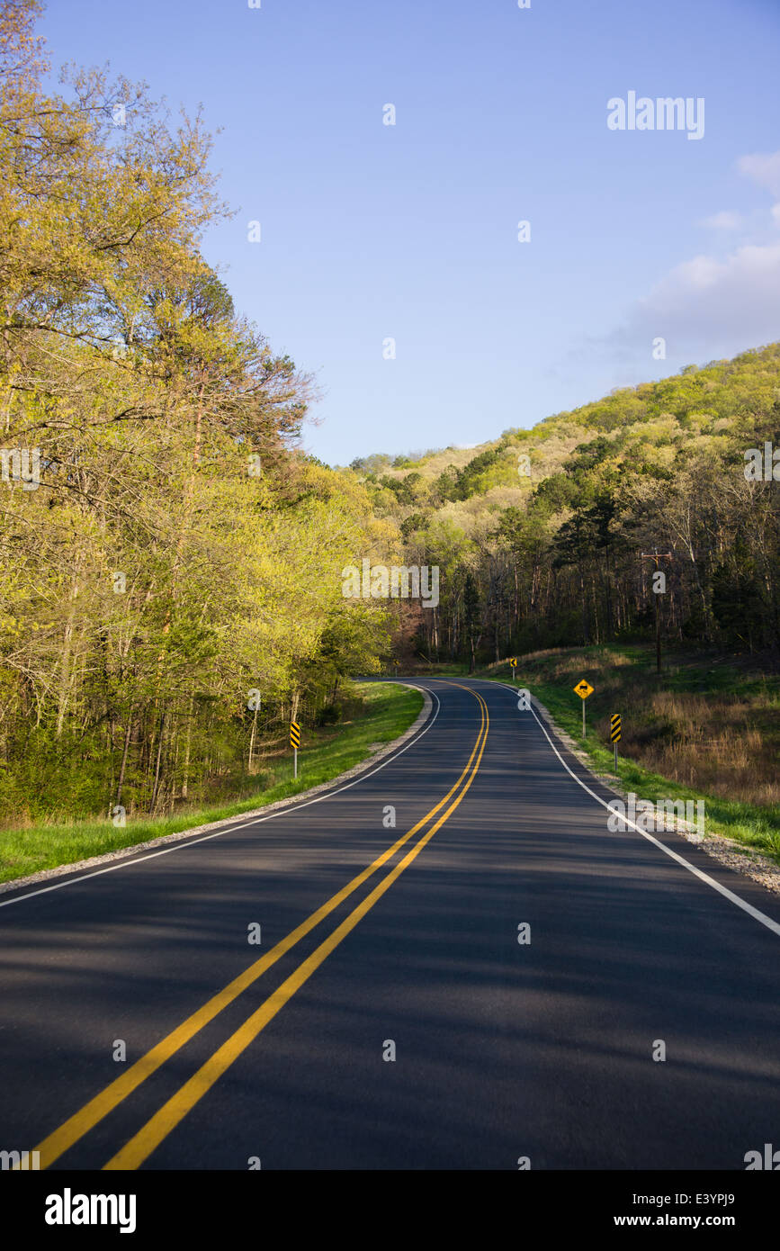 Highway 16 outside of Greers Ferry, Arkansas receding into the distance. Stock Photo
