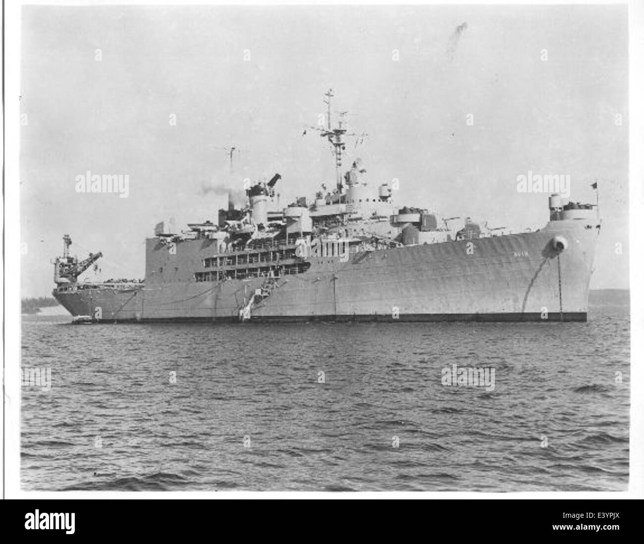 This photograph features the USS Pine Island (AV-12), a seaplane tender