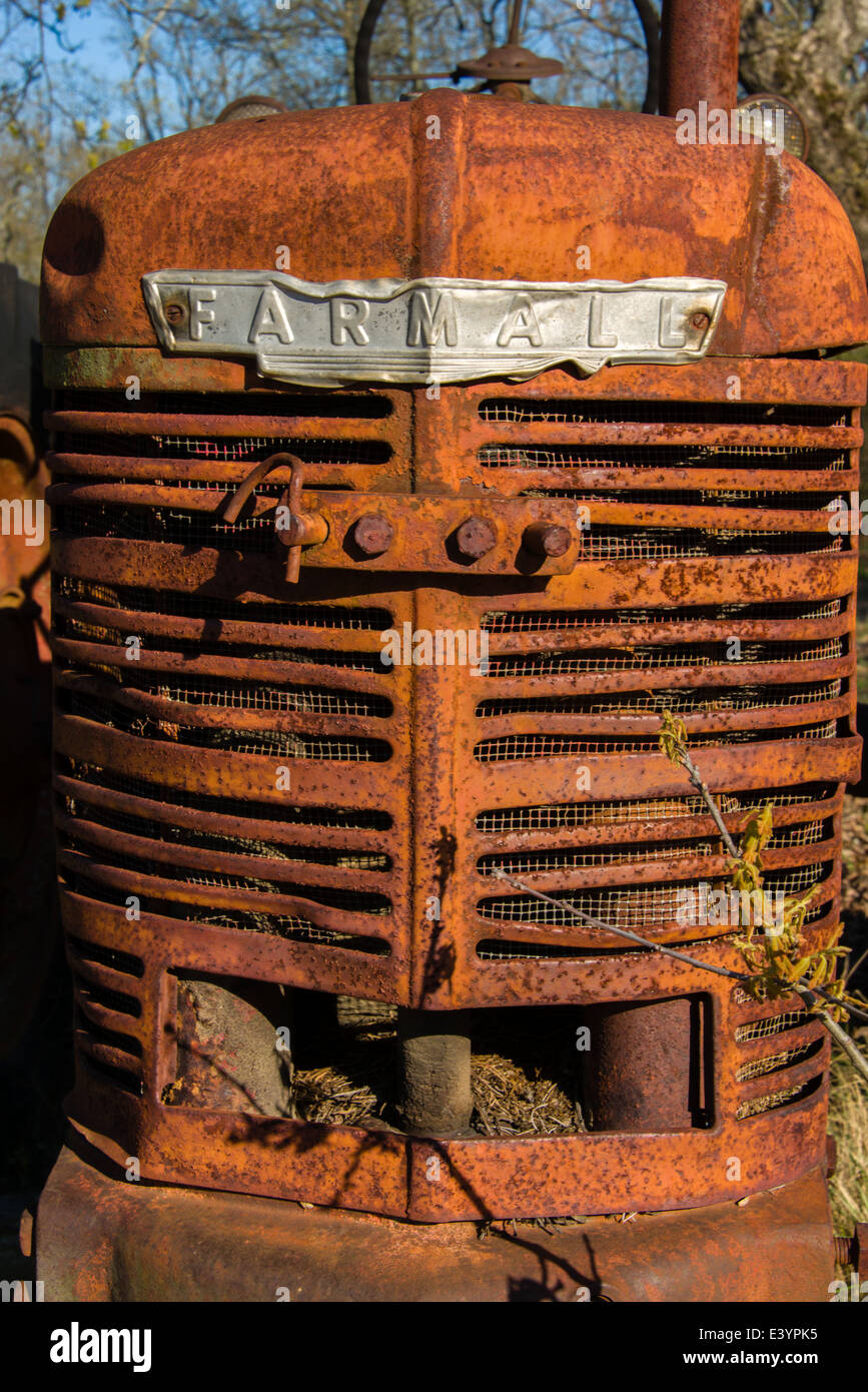 Grill of an antique Farmal tractor in the Ozark foothills of Arkansas. Stock Photo