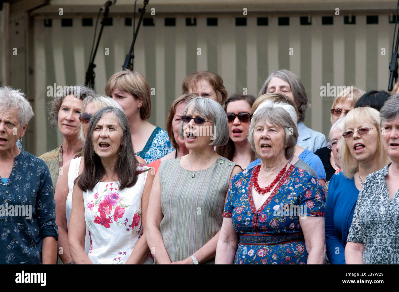 Women singing in a community choir, Leamington Peace Festival, UK Stock Photo