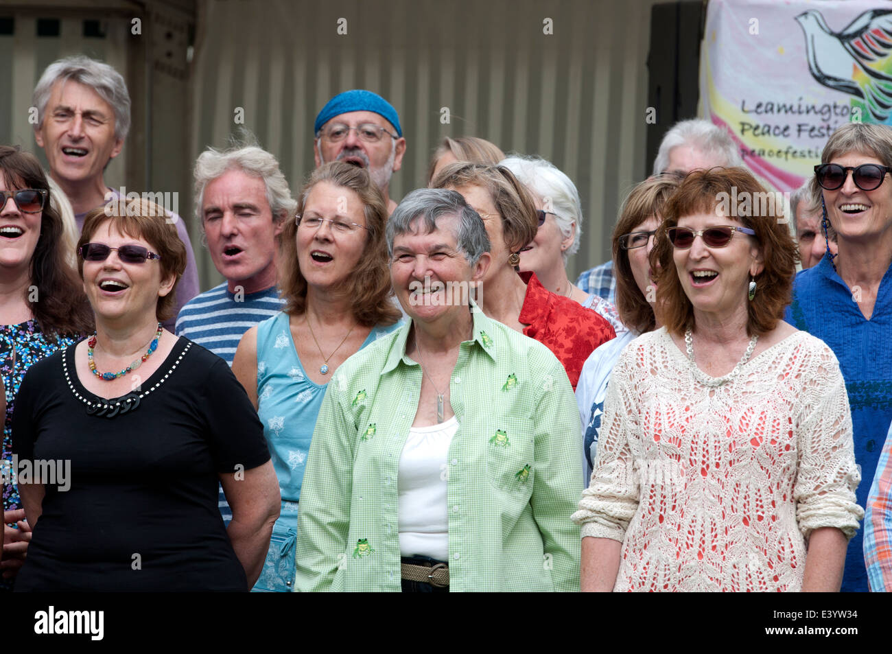 People singing in a community choir, Leamington Peace Festival, UK Stock Photo