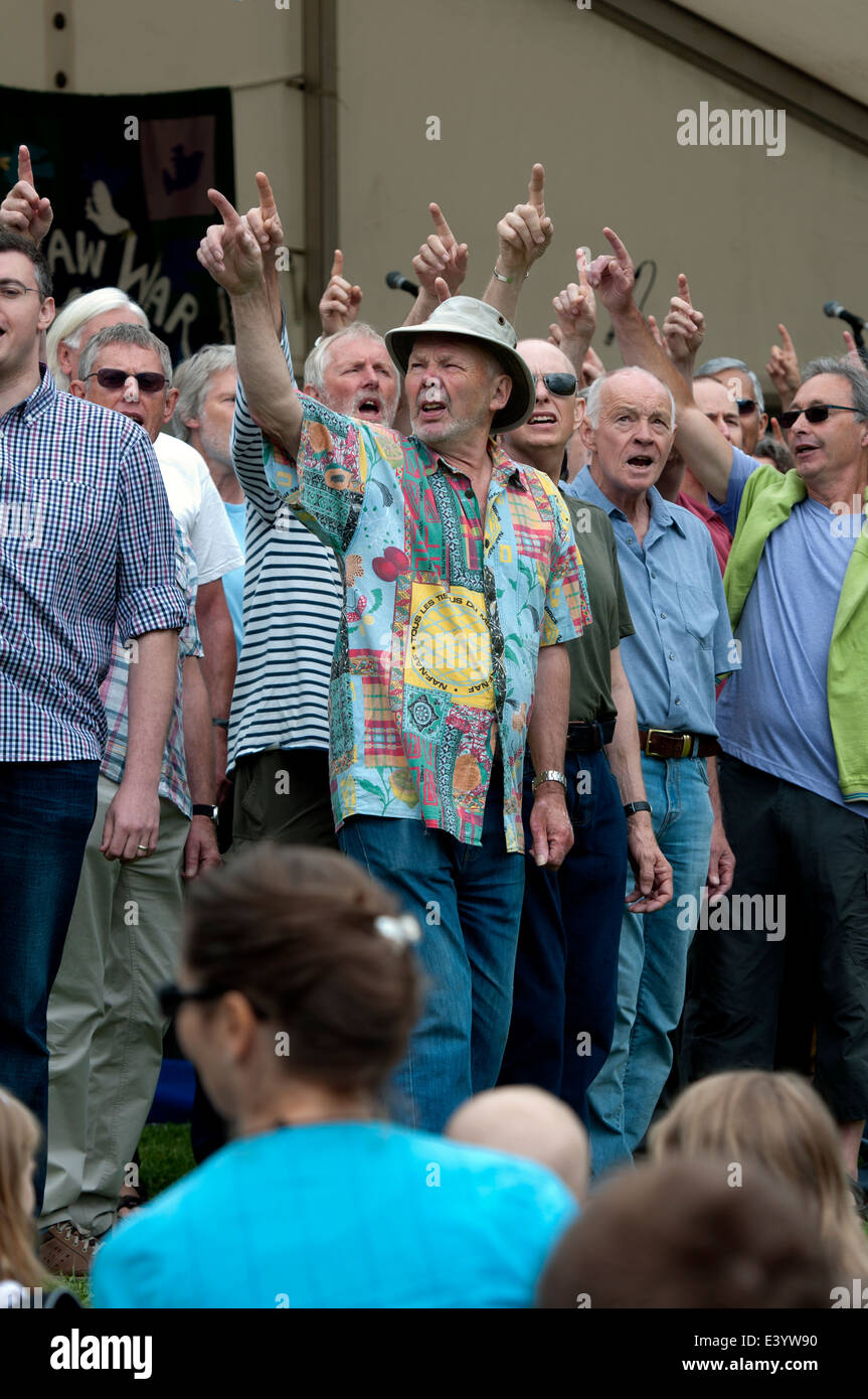 Men singing in a community choir at Leamington Peace Festival, UK Stock Photo