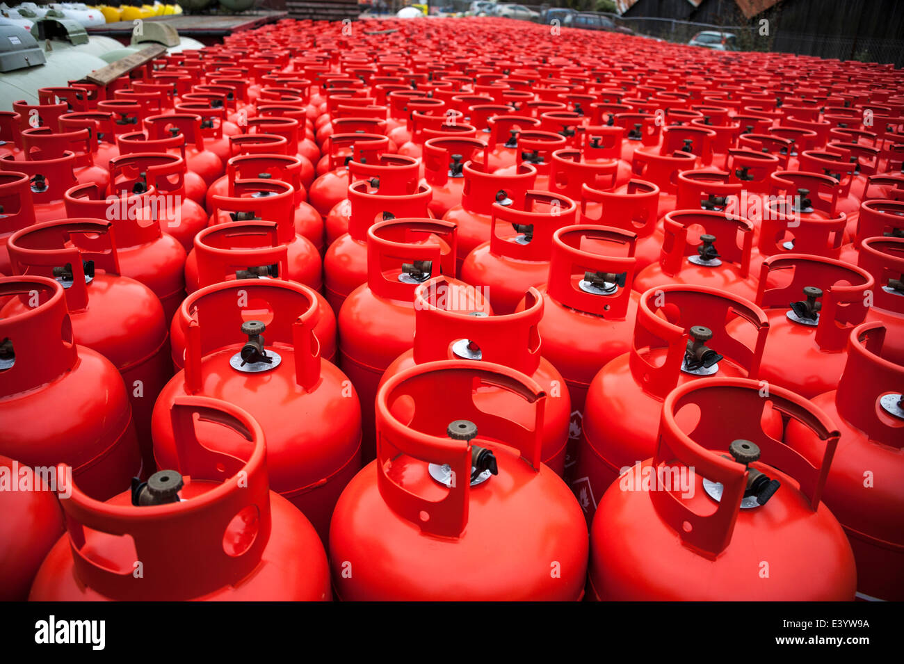 Rows of liquefied gas bottles, standing at a storage depot Stock Photo