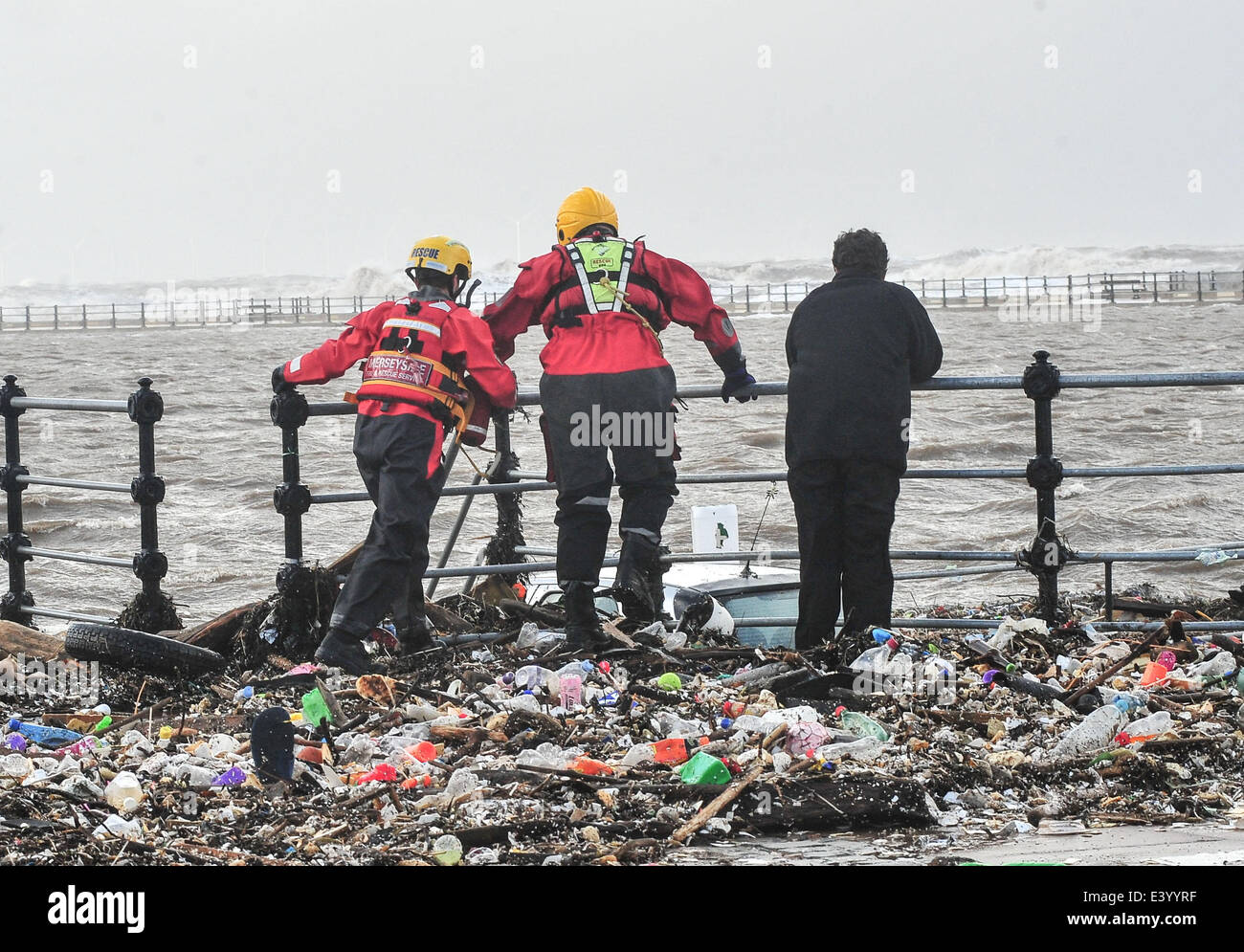 Severe storms and floods Battered New Brighton in Liverpool emergency services were stretched as they try to rescue people who were caught in the middle of a storm that flooded the town.  Featuring: Atmosphere Where: Liverpool, United Kingdom When: 05 Dec Stock Photo