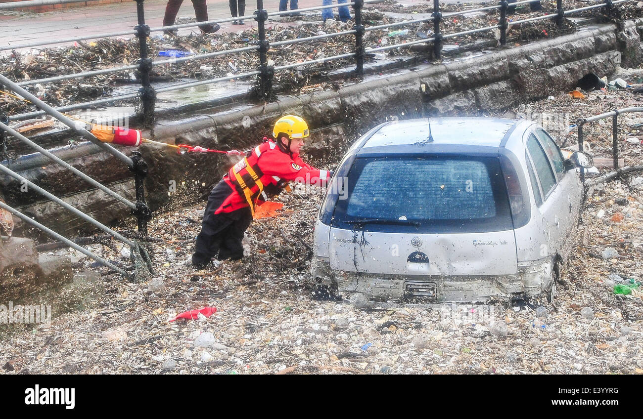 Severe storms and floods Battered New Brighton in Liverpool emergency services were stretched as they try to rescue people who were caught in the middle of a storm that flooded the town.  Featuring: Atmosphere Where: Liverpool, United Kingdom When: 05 Dec Stock Photo