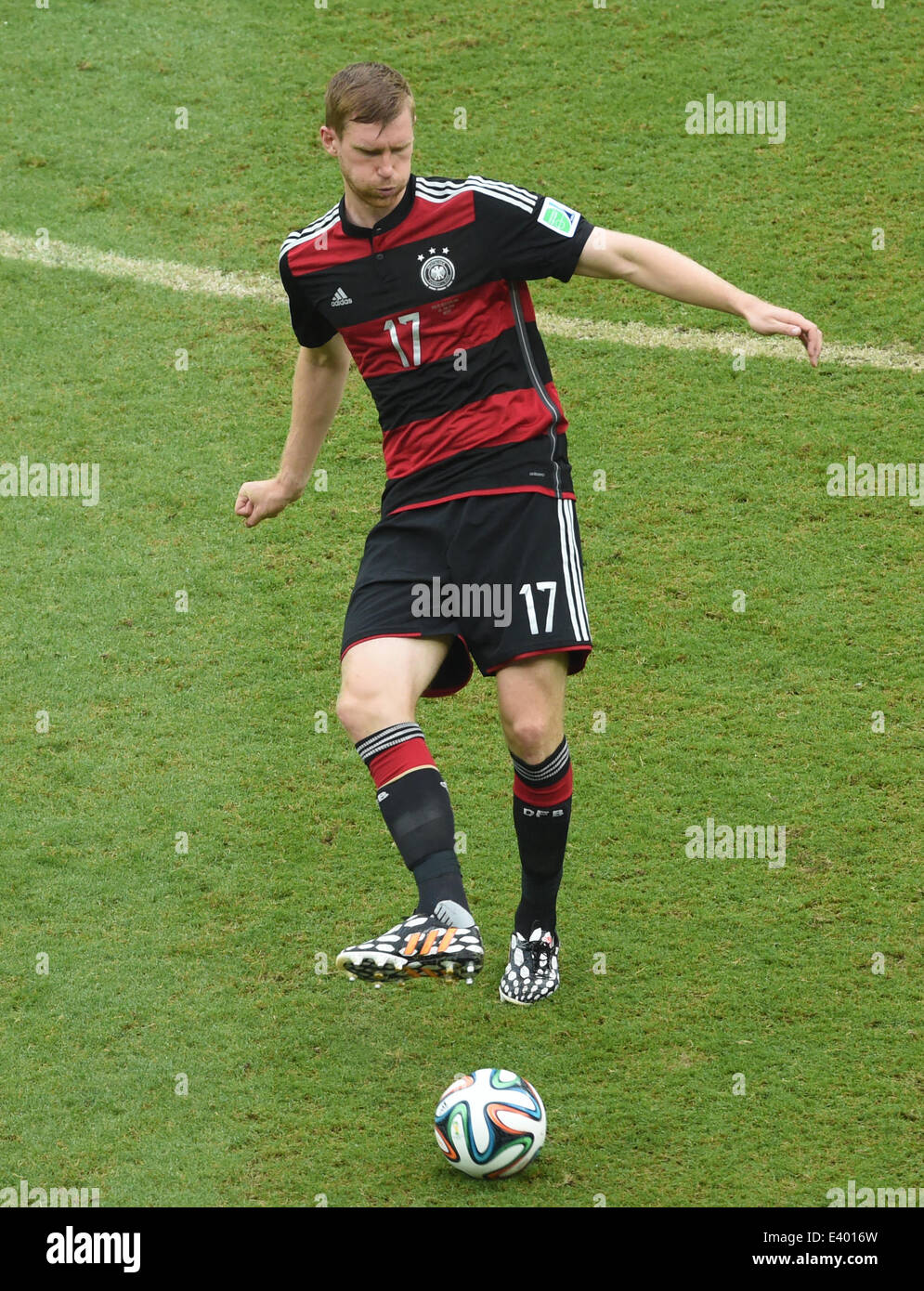 Per Mertesacker of Germany controls the ball during the FIFA World Cup