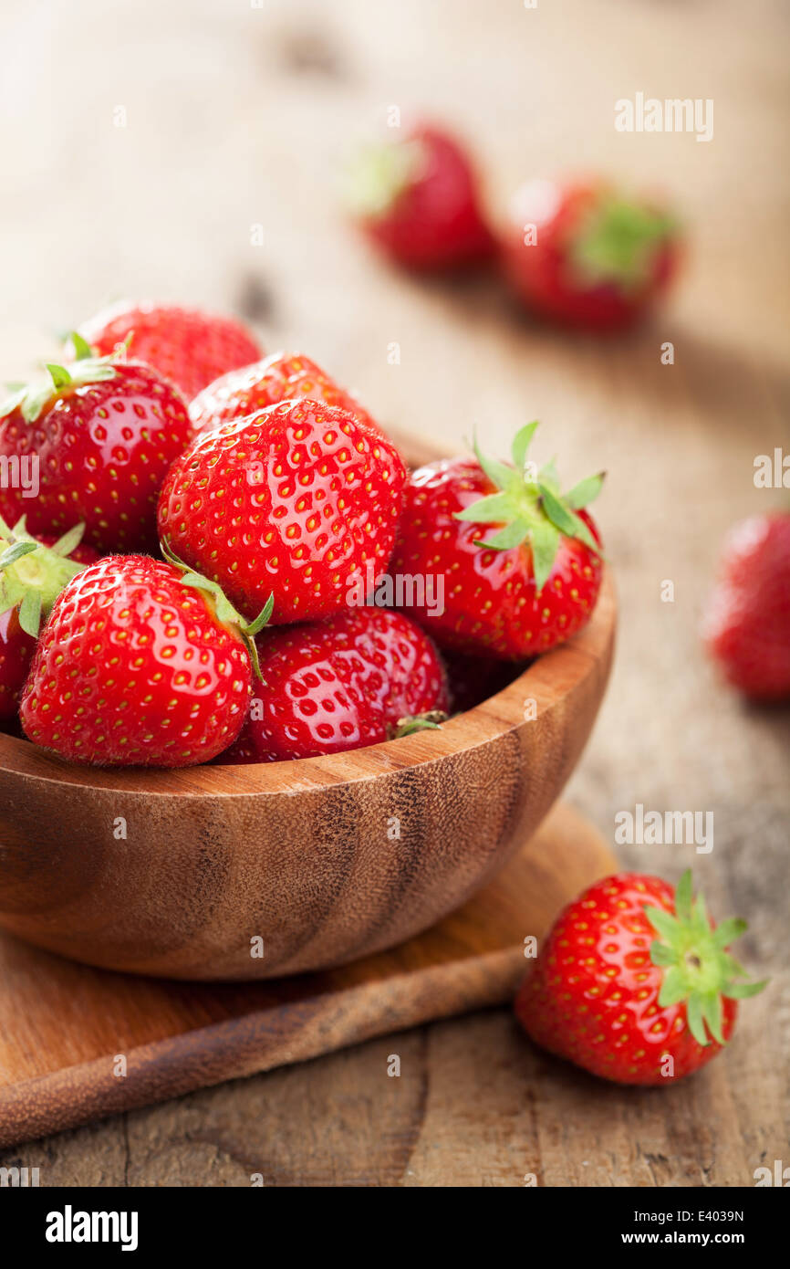 fresh strawberry in wooden bowl Stock Photo