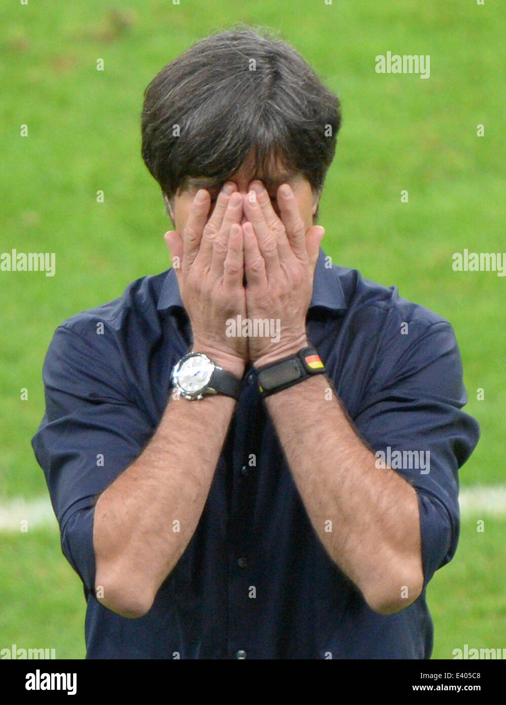 Porto Alegre, Brazil. 30th June, 2014. Germany's head coach Joachim Loew reacts during the FIFA World Cup 2014 round of 16 soccer match between Germany and Algeria at the Estadio Beira-Rio in Porto Alegre, Brazil, 30 June 2014. Photo: Thomas Eisenhuth/dpa/Alamy Live News Stock Photo