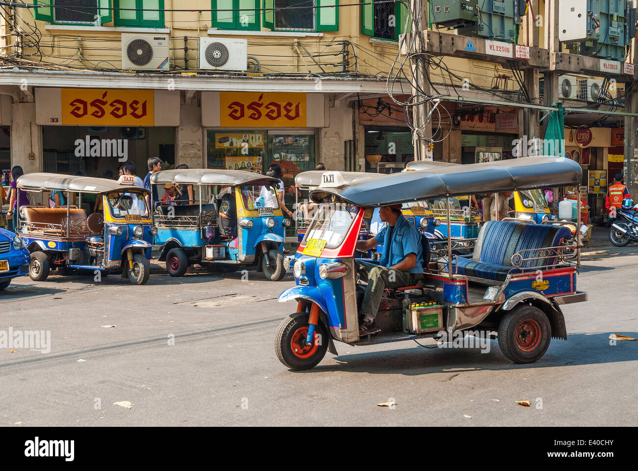 tuk tuk taxis on street in bangkok thailand Stock Photo