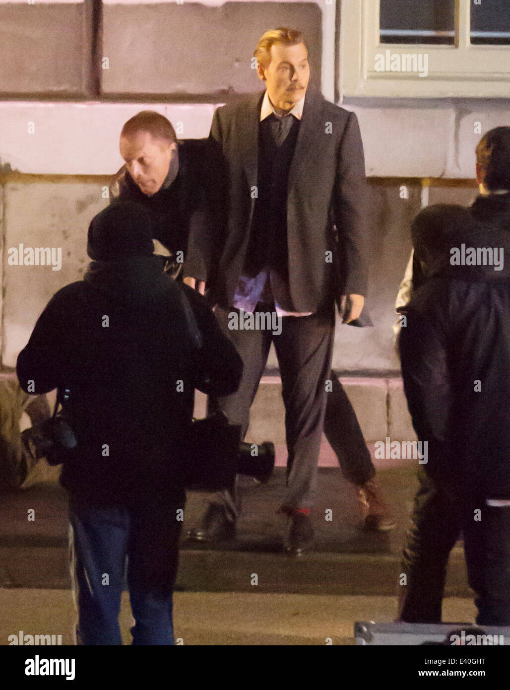 Johnny Depp filming on the set of 'Mortdecai' in London. During the