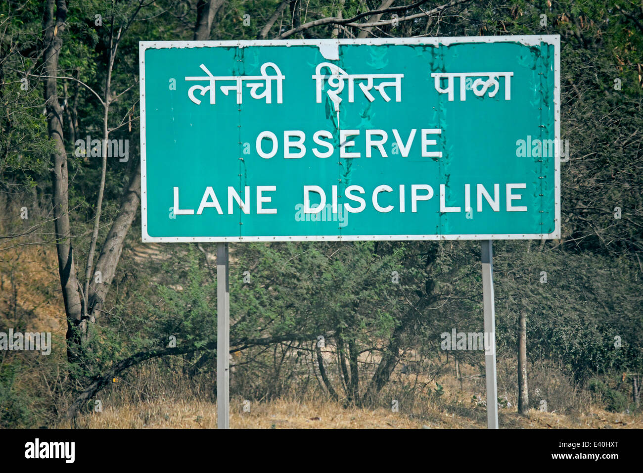 observe lane discipline road signs Stock Photo