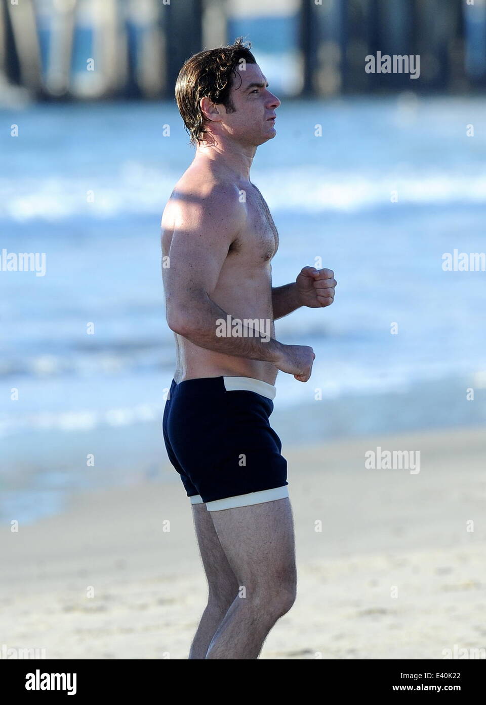 Liev Schreiber shows off his toned body on the filmset of "Pawn Sacrifice"  filming on Santa Monica Beach. The hunky actor was seen flexing his biceps  and running around the beach while