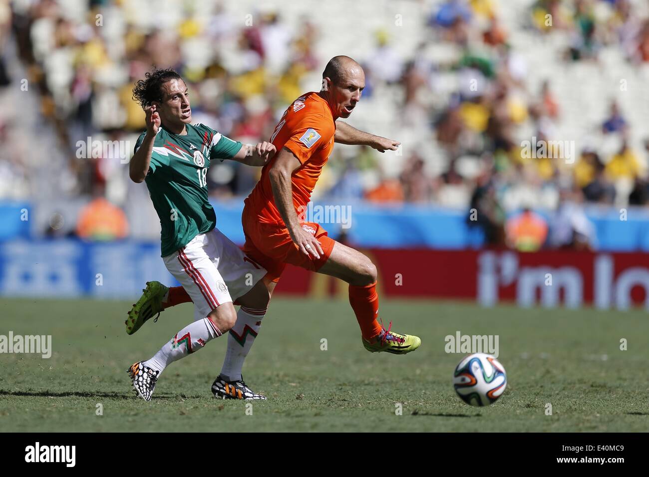 (L-R) Andres Guardado (MEX), Arjen Robben (NED), JUNE 29, 2014 - Football / Soccer : FIFA World Cup Brazil match between Netherlands and Mexico at the Castelao stadium in Fortaleza, Brazil. (Photo by AFLO) Stock Photo