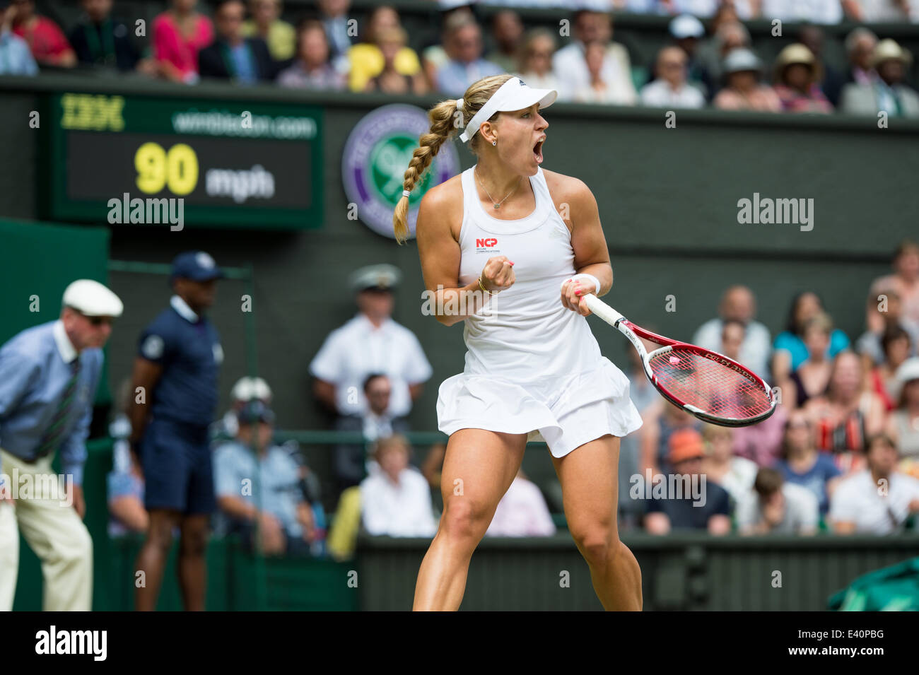 Wimbledon, London, UK. 1st July, 2014. Tennis: Wimbledon Championship 2014, Angelique Kerber of Germany celebrates during her Ladies' Singles fourth round match against Maria Sharapova of Russia on day eight of the Wimbledon Lawn Tennis Championships at the All England Lawn Tennis and Croquet Club at Wimbledon on July 1, 2014, London, England. Credit:  dpa picture alliance/Alamy Live News Stock Photo