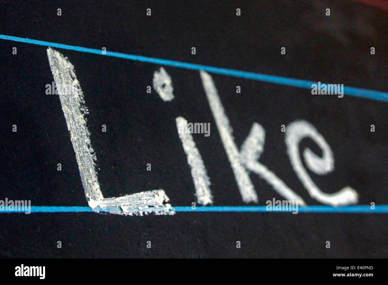 like word handwritten on black chalkboard Stock Photo Alamy