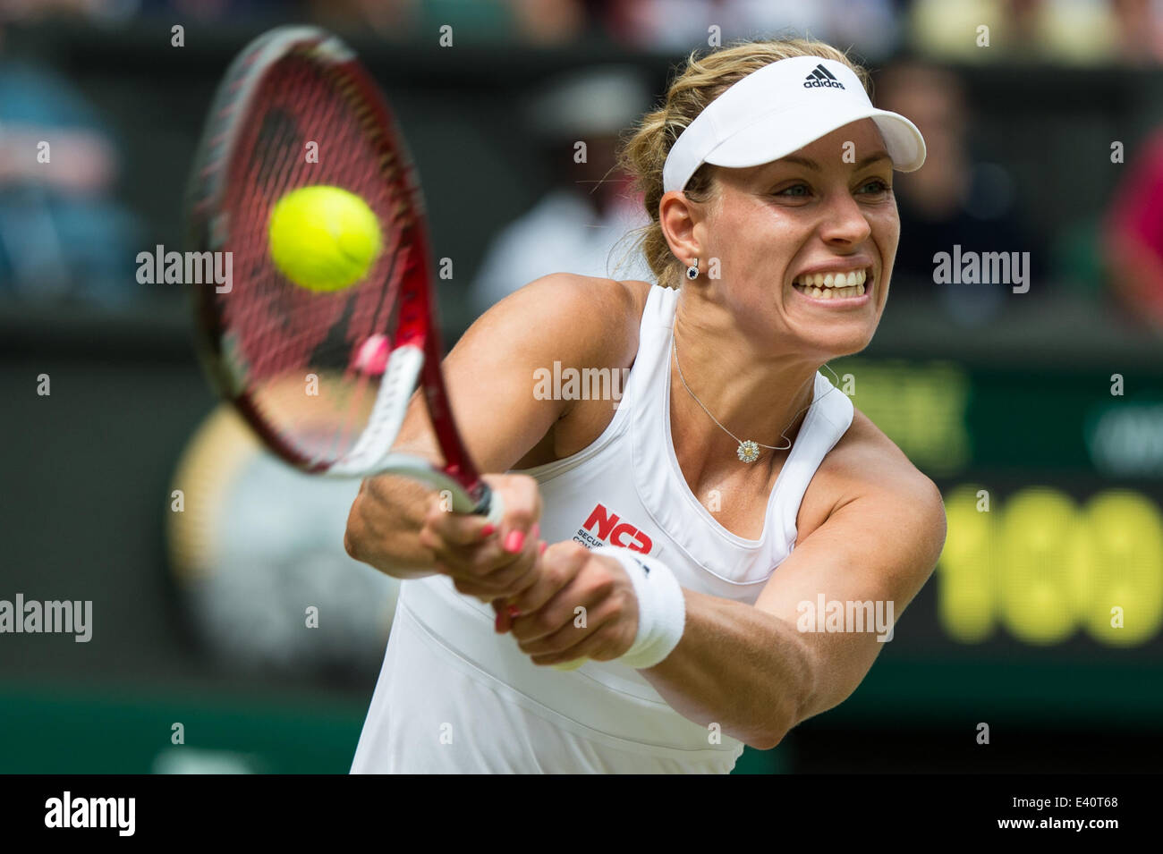 Wimbledon, London, UK. 1st July, 2014. Tennis: Wimbledon Championship 2014, Angelique Kerber of Germany during her Ladies' Singles fourth round match against Maria Sharapova of Russia on day eight of the Wimbledon Lawn Tennis Championships at the All England Lawn Tennis and Croquet Club at Wimbledon on July 1, 2014, London, England. Credit:  dpa picture alliance/Alamy Live News Stock Photo