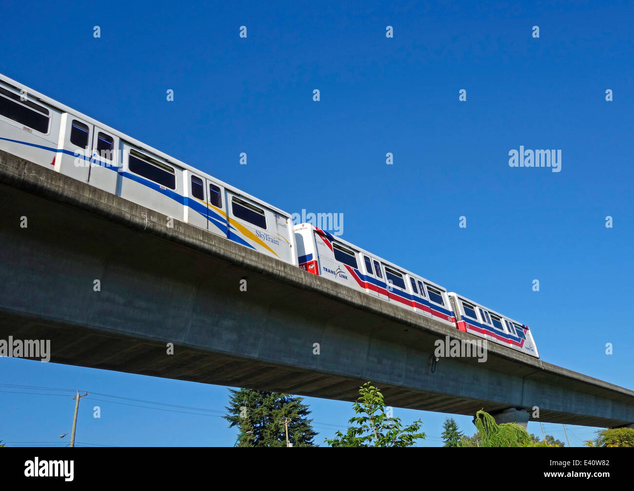 Vancouver Skytrain traveling along the Millennium line through the ...