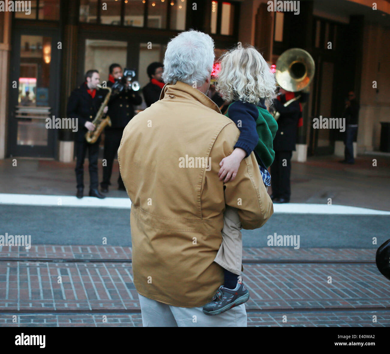 CSI star William L Petersen out with his wife Gina and two year old twins visit The Grove shopping Mall in West Hollywood  Featuring: William L Petersen Where: Los Angeles, California, United States When: 11 Dec 2013 Stock Photo