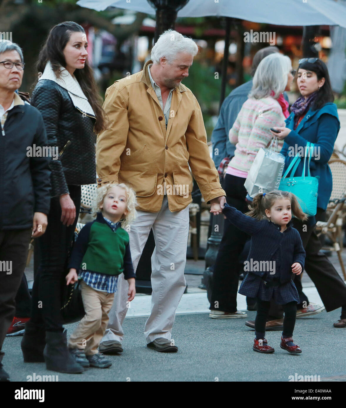 CSI star William L Petersen out with his wife Gina and two year old twins visit The Grove shopping Mall in West Hollywood  Featuring: Gina Cirone,William L Petersen Where: Los Angeles, California, United States When: 11 Dec 2013 Stock Photo