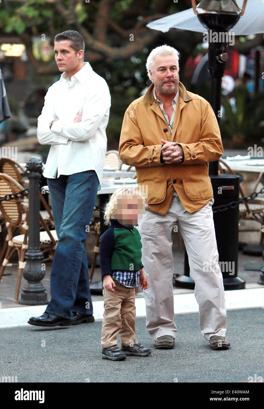 CSI star William L Petersen out with his wife Gina and two year old twins visit The Grove shopping Mall in West Hollywood  Featuring: William L Petersen Where: Los Angeles, California, United States When: 11 Dec 2013 Stock Photo