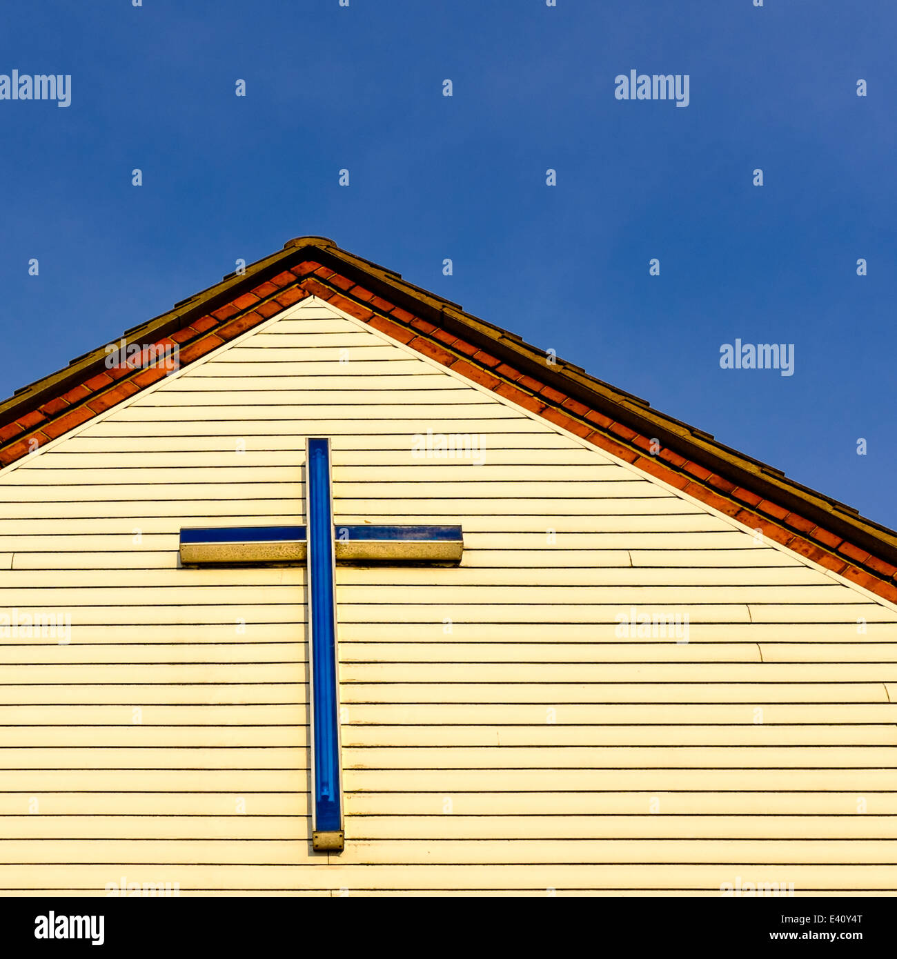 2nd July 2014. Cross/crucifix atop the front facia of St Wilfrid's Parish Hall. Church Street