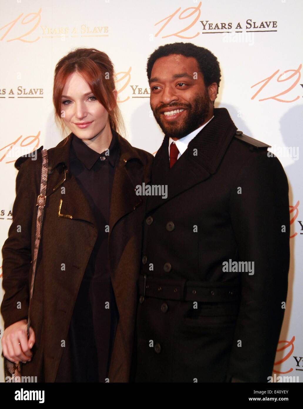'12 years of slave' premiere in Paris  Featuring: Chiwetel Ejiofor,wife Where: Paris, France When: 11 Dec 2013 Stock Photo