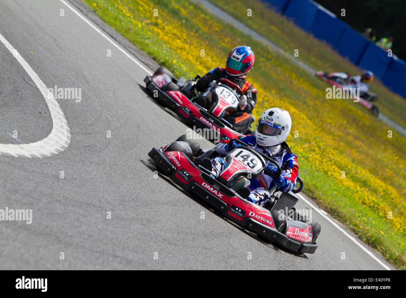 Go-Karting at the Mercedes-Benz World at the famous Brooklands circuit in Surrey, raising money for the Henry Surtees Foundation. Brooklands 01.07.2014 Theodore Liasi/Alamy Live News Stock Photo