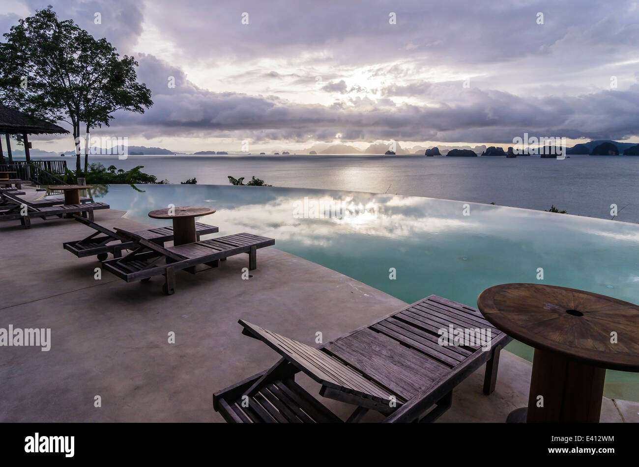 Thailand, Ko Yao Noi, Andaman Sea with swimming pool in foreground Stock Photo