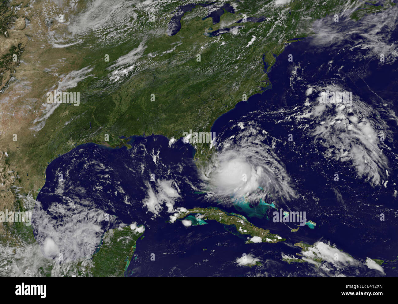 Satellite imagery shows the first Atlantic tropical storm of the 2014 season as it gathers strength off the coast of Florida July 1, 2014 near Settlement Point, Grand Bahama Island. The cyclone is expected to become Hurricane Arthur within 72 hours and move up the east coast making landfall on the Outer Banks of North Carolina. Stock Photo