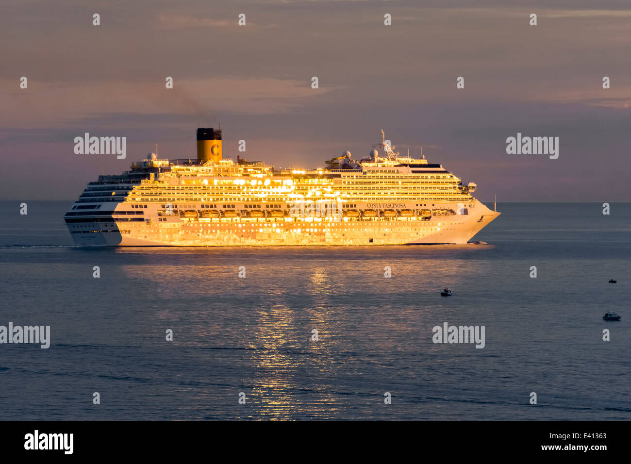 Croatia, Dubrovnik, view to cruise liner Costa Fascinosa at golden sunlight Stock Photo