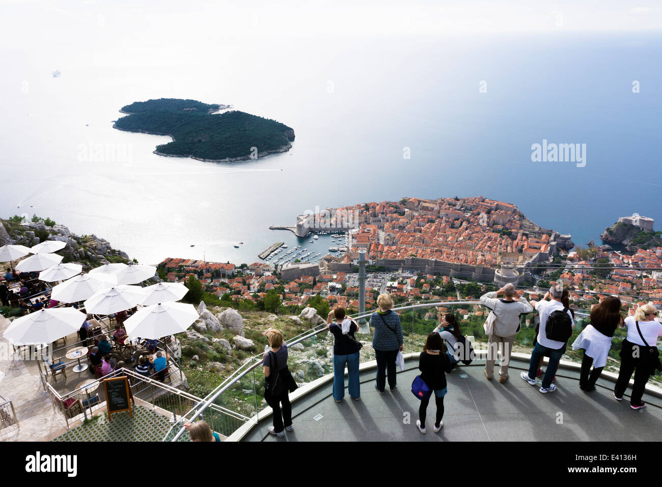 Croatia, Dubrovnik, tourists enjoying view from visitors terrace, elevated view Stock Photo