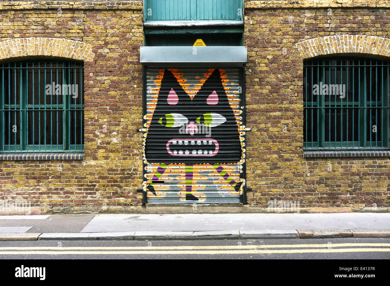 England, London, Shoreditch, Christina Street, graffito of Malarky on shutter Stock Photo
