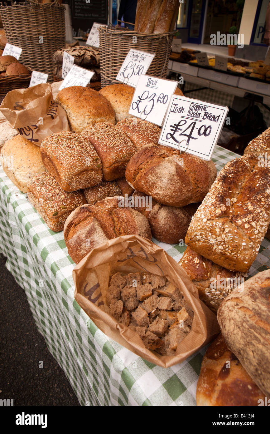 UK England, Suffolk, Bury St Edmunds, market stall selling freshly baked loaves of bread Stock Photo