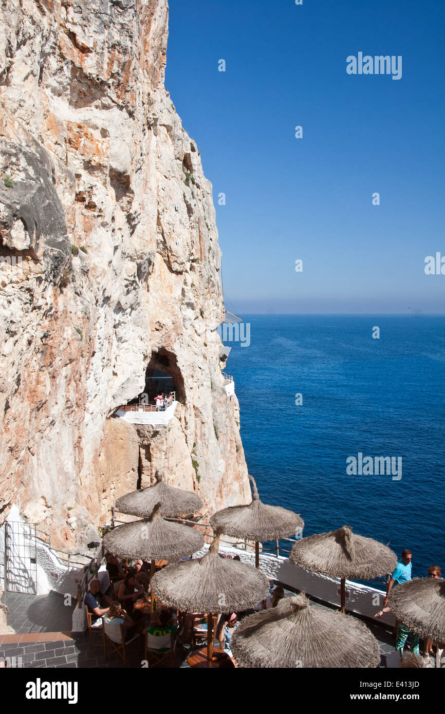 Cafe bar in the Cova d'en Xoroi cave complex, Cala'n Porter, Menorca, Spain Stock Photo