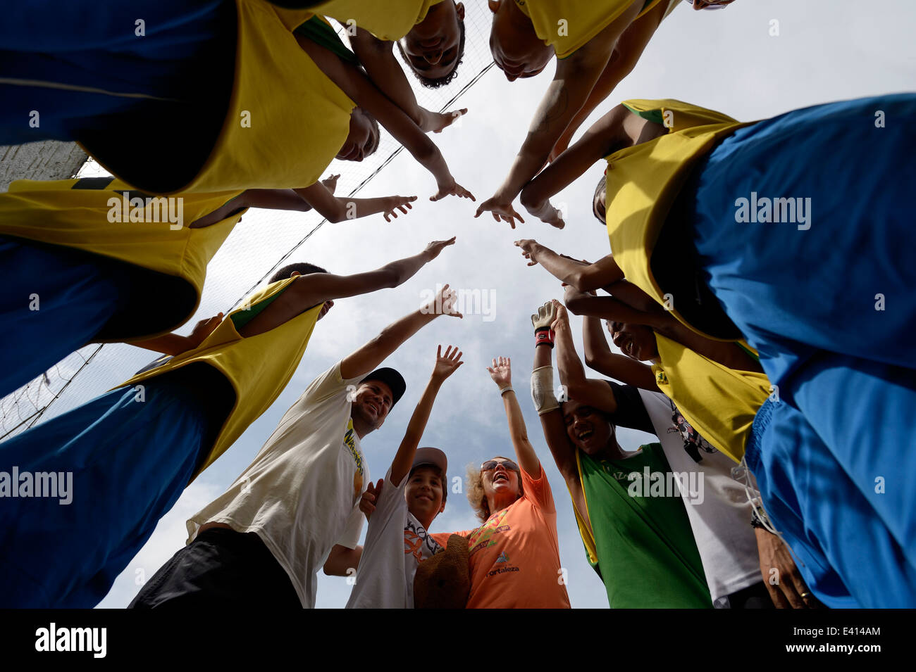 Brazil, Rio de Janeiro, football team of Street Child World Cup 2014, view from below Stock Photo