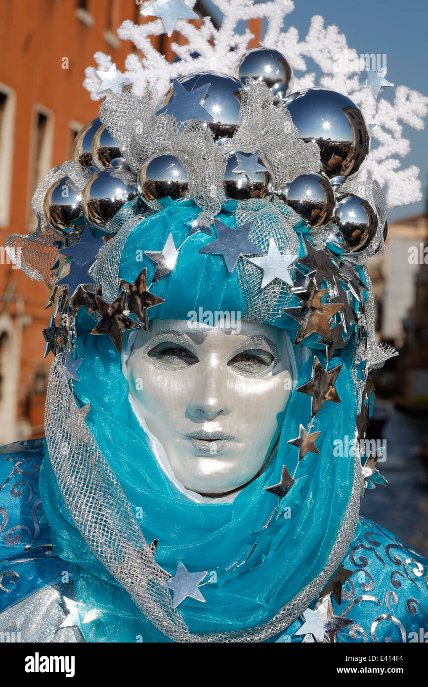 Italy, Venice, man wearing fancy-dress costume at carnival Stock Photo