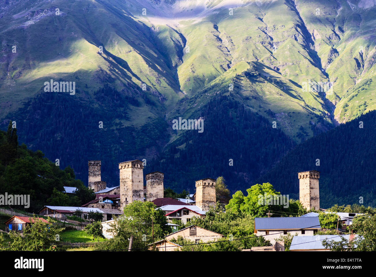 Koshki fortified towers overview with mountains backdrop in Mestia, Svaneti, Georgia Stock Photo