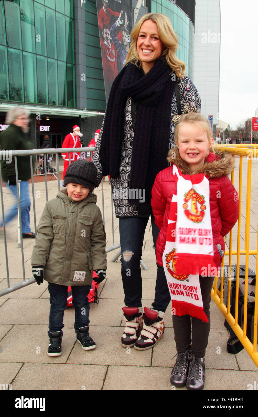Manchester United football player Michael Carrick kicks off the 7th annual Manchester United Foundation Santa Run  Featuring: Jacey Carrick,Lisa Carrick,Louise Carrick Where: Manchester, United Kingdom When: 15 Dec 2013 Stock Photo