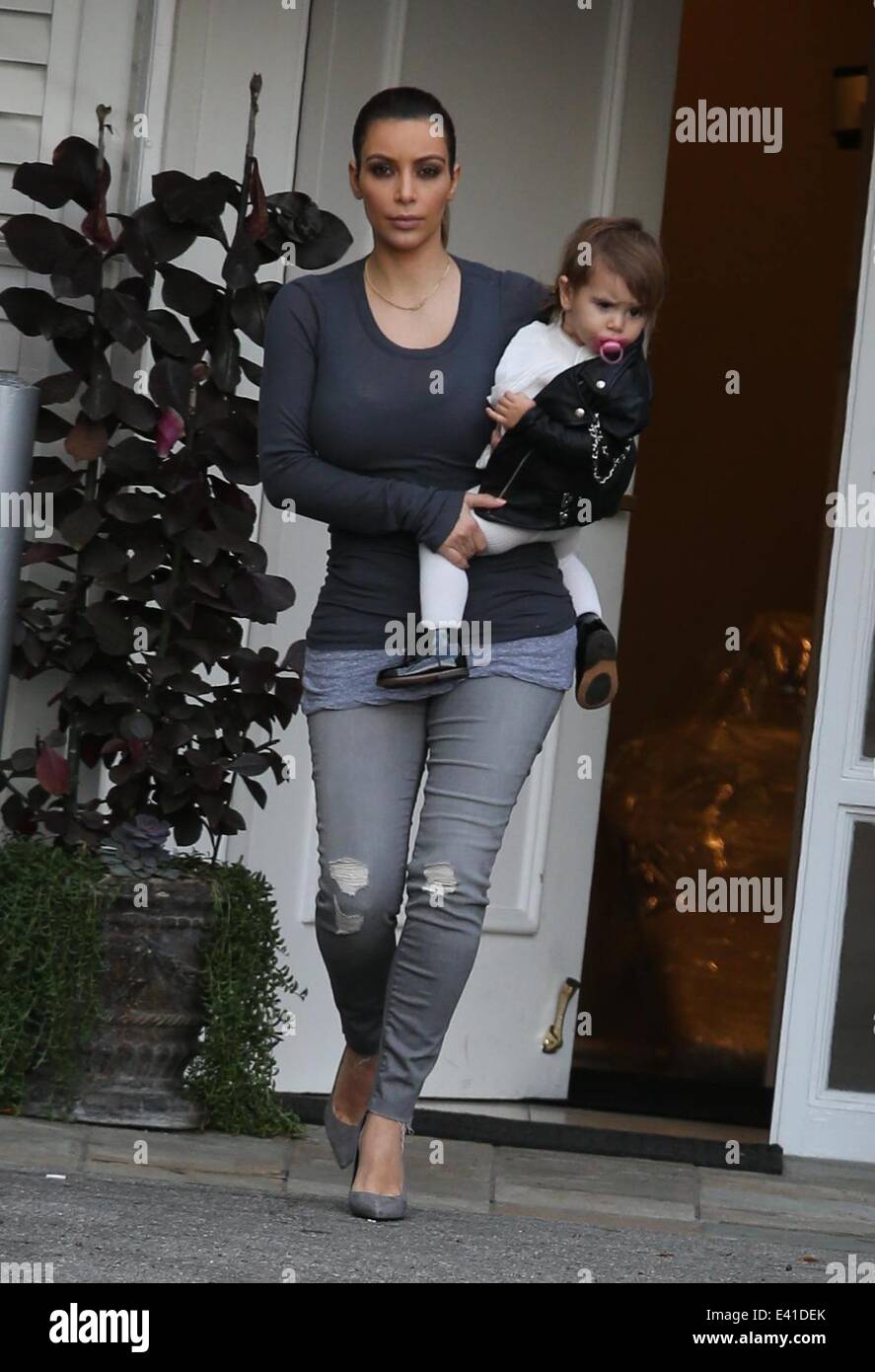 Kim Kardashian leaving Epione Cosmetic Laser Center with her sister