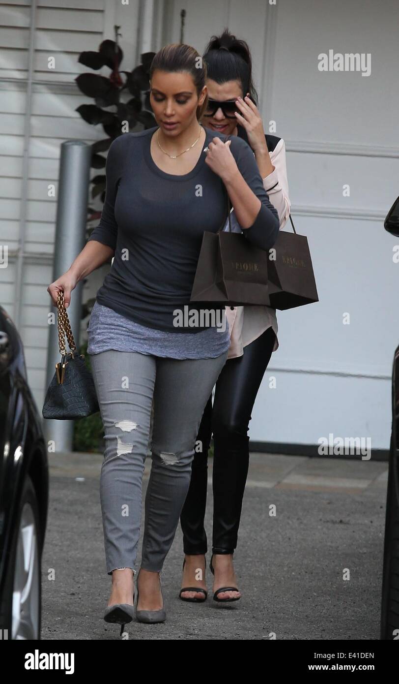 Kim Kardashian leaving Epione Cosmetic Laser Center with her sister