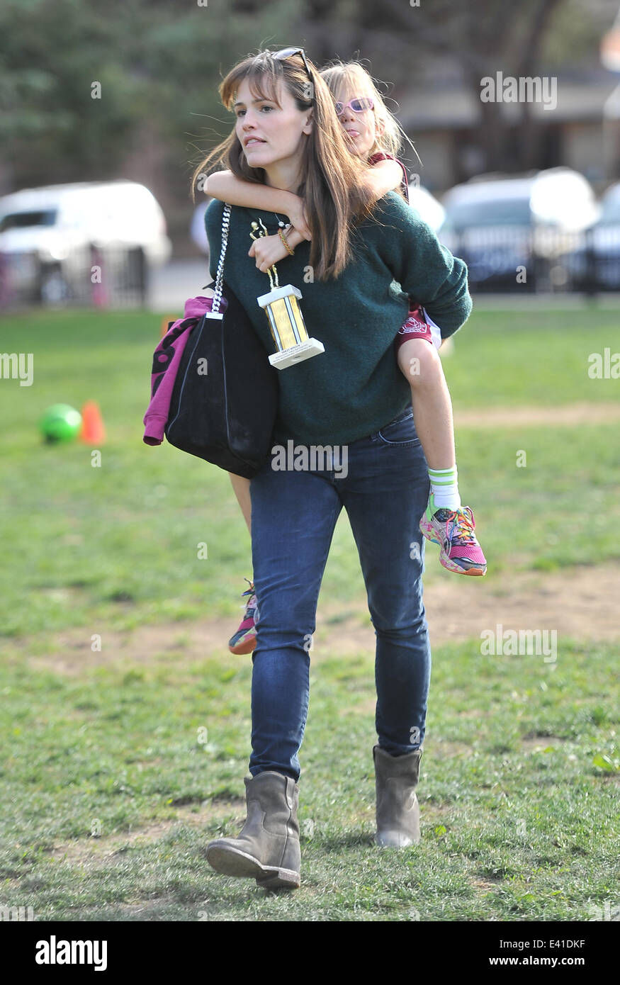 Jennifer Garner gives her daughter Violet a piggyback ride after she