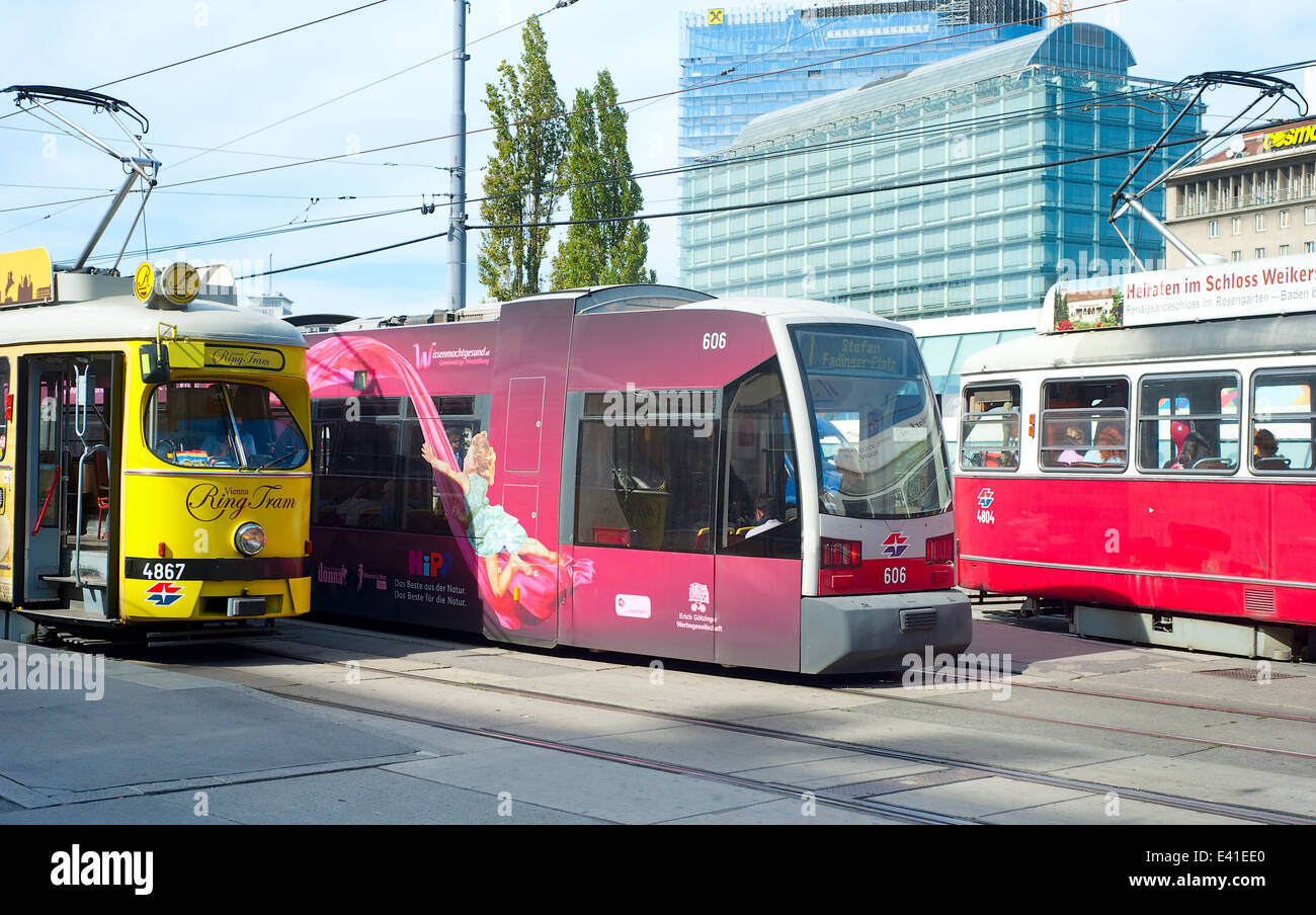 Trams at a tram stop Vienna. With 172 km total length, Vienna Tram network is among the largest in the world. Stock Photo