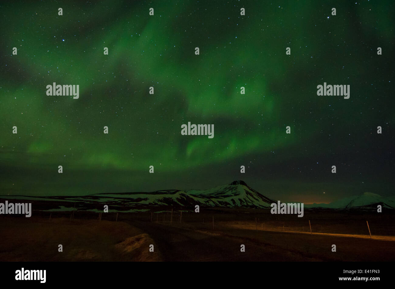 Aurora Borealis Lights Up Mountains in Iceland Stock Photo - Alamy