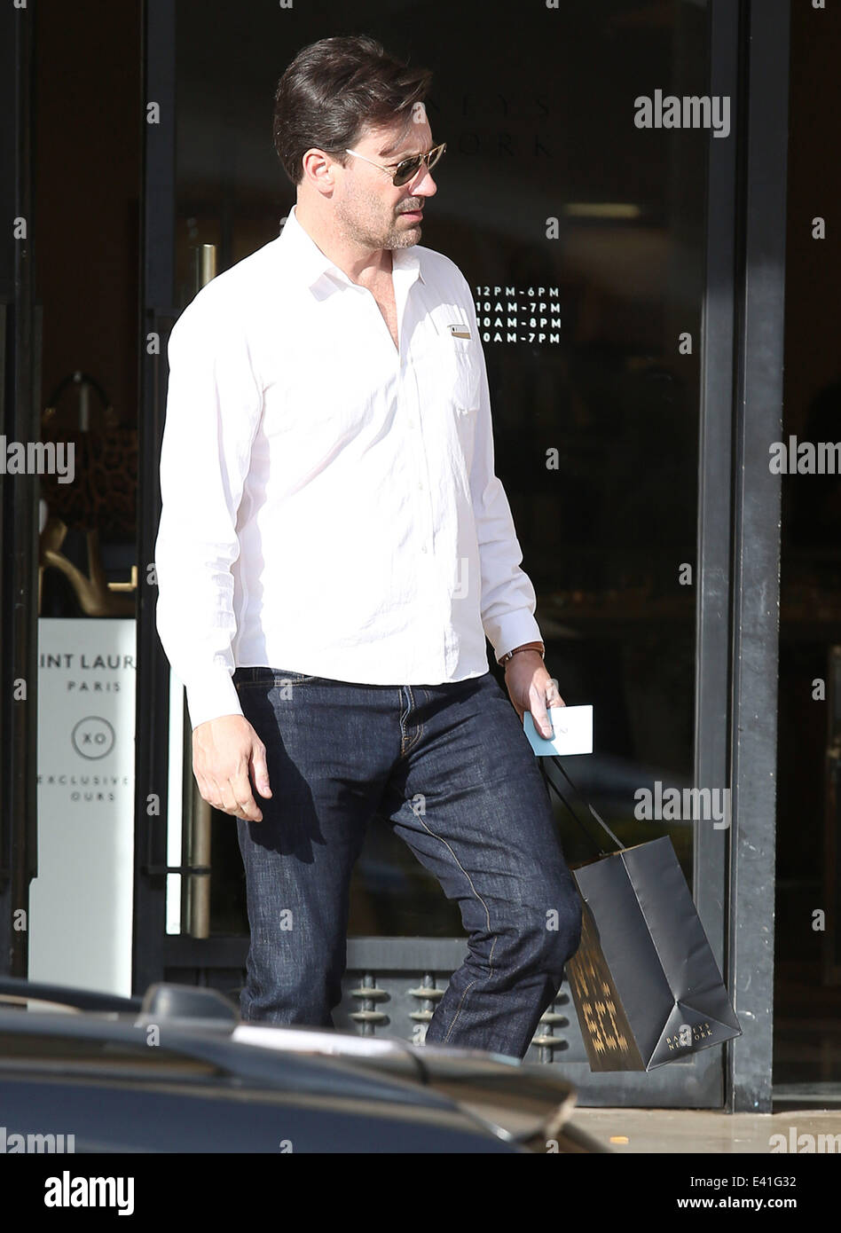 Mad men actor Jon Hamm treats his girlfriend Jennifer Westfeldt to some