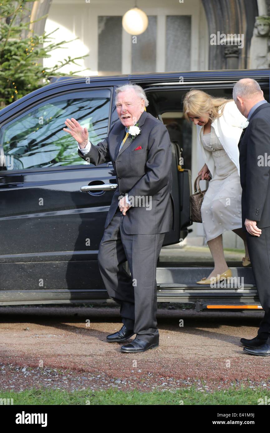89 year old Leslie Philips seen arriving with his bride Zara Carr, who is about half his age, at a church near their home for the marriage to be blessed.  Featuring: Leslie Philips,Zara Carr Where: London, United Kingdom When: 20 Dec 2013 Stock Photo