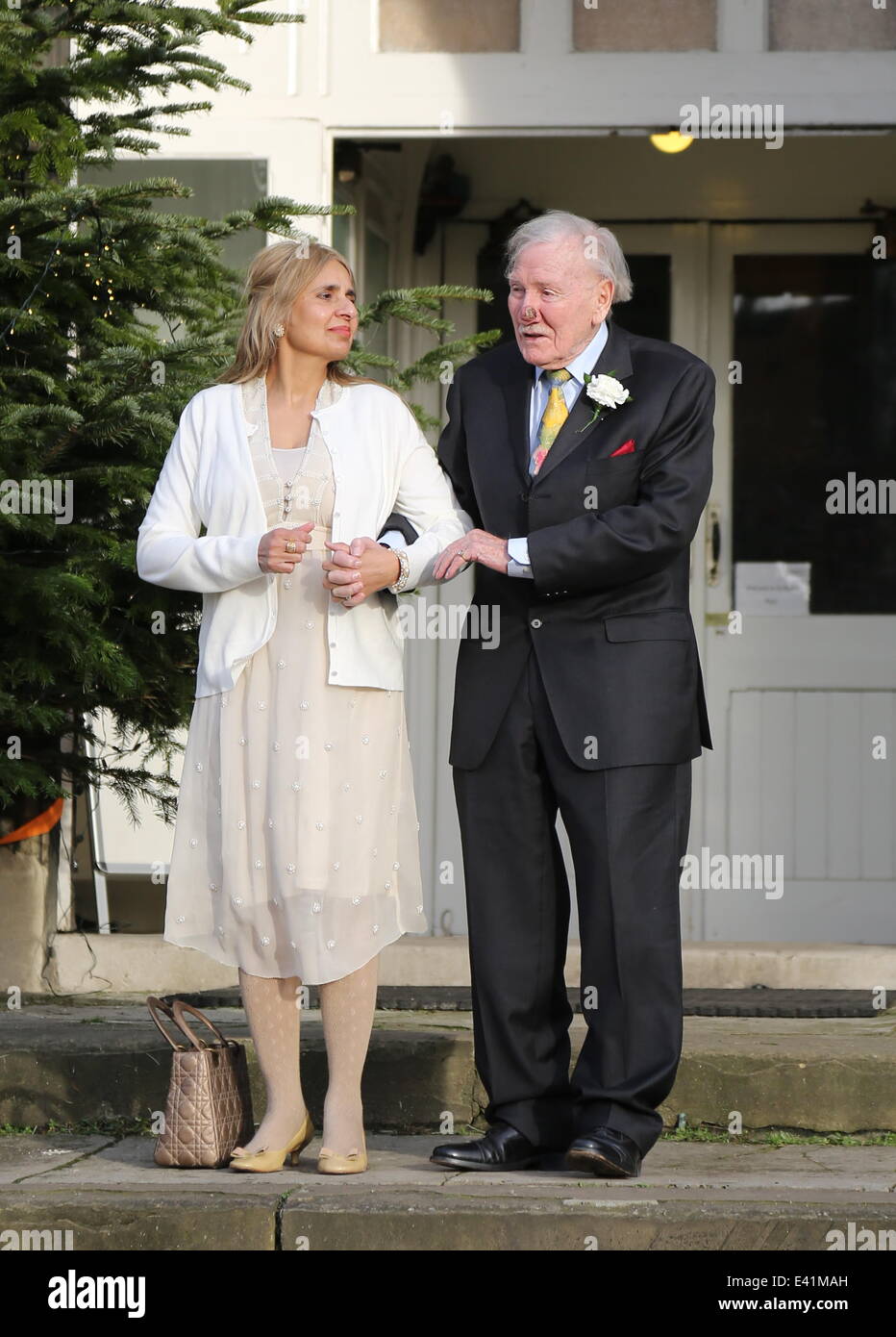 89 year old Leslie Philips seen arriving with his bride Zara Carr, who is  about half his age, at a church near their home for the marriage to be  blessed. Featuring: Leslie