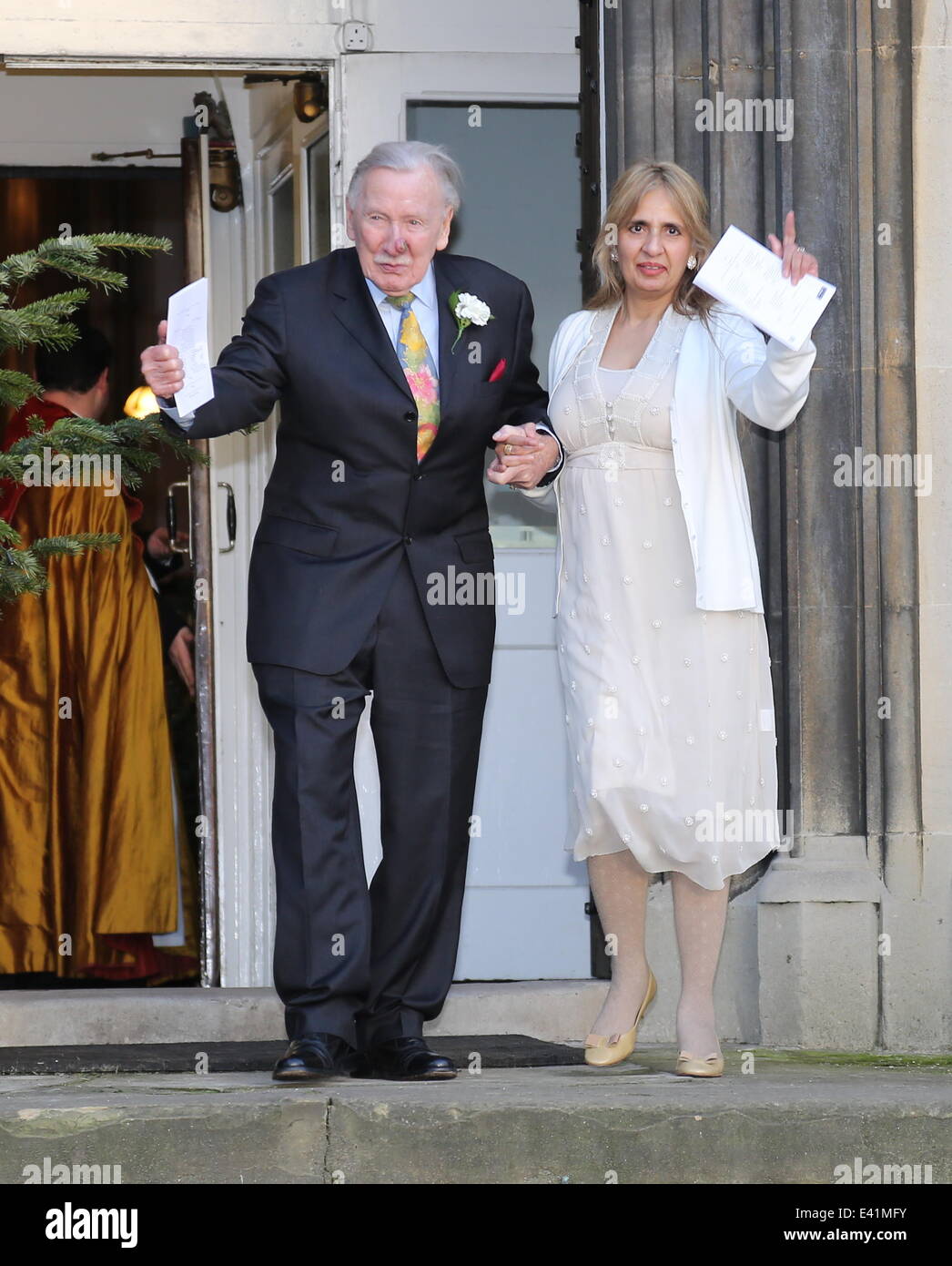 Leslie Philips and Zara Carr seen leaving a local church after the marriage blessing.  Featuring: Leslie Phillips,Zara Carr Where: London, United Kingdom When: 20 Dec 2013 Stock Photo