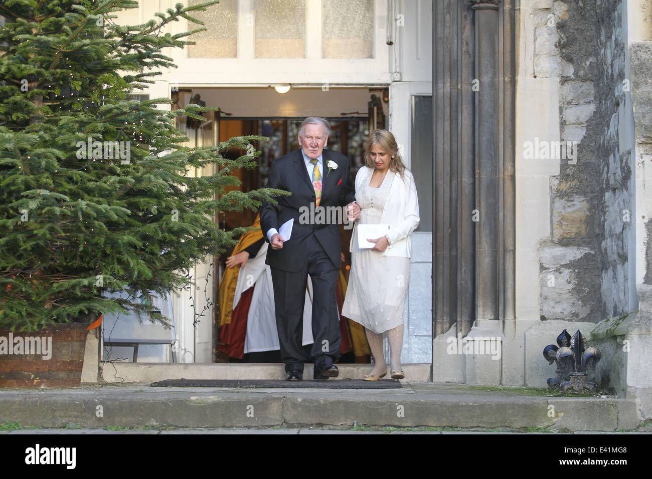 Leslie Philips and Zara Carr seen leaving a local church after the marriage blessing.  Featuring: Leslie Phillips,Zara Carr Where: London, United Kingdom When: 20 Dec 2013 Stock Photo