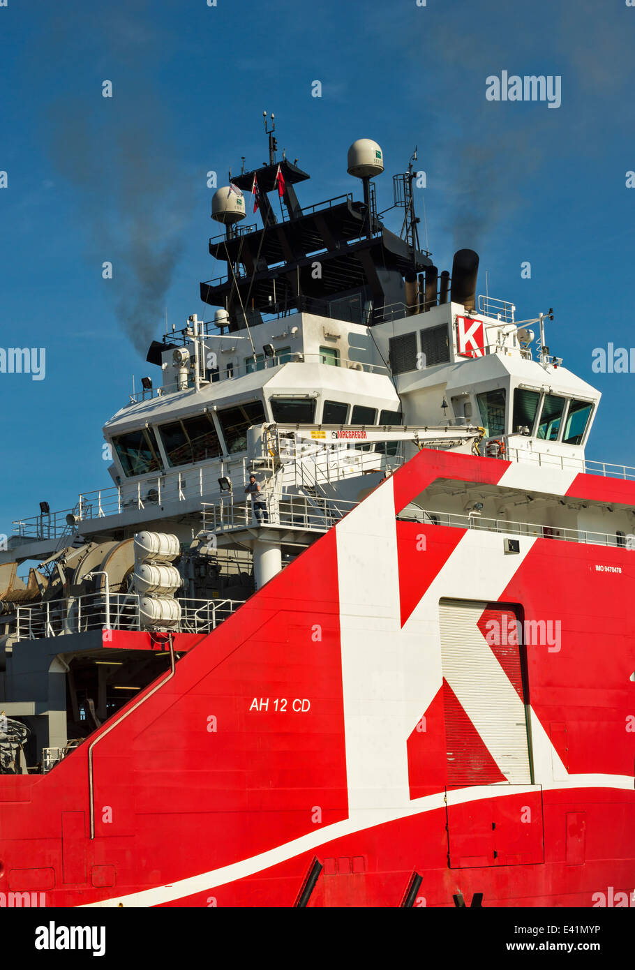 BRIDGE DECK AND SMOKE FROM THE EXHAUST FUNNELS OF A  NORTH SEA OIL SERVICE SHIP Stock Photo